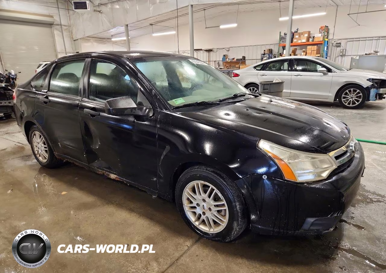 2009 Ford Focus Se VIN:1FAHP35N49W200562 - 4