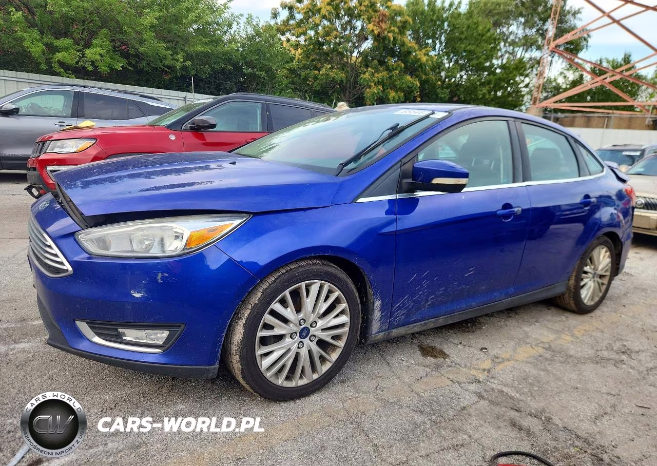 2015 Ford Focus Titanium VIN:1FADP3J24FL339520 - 1