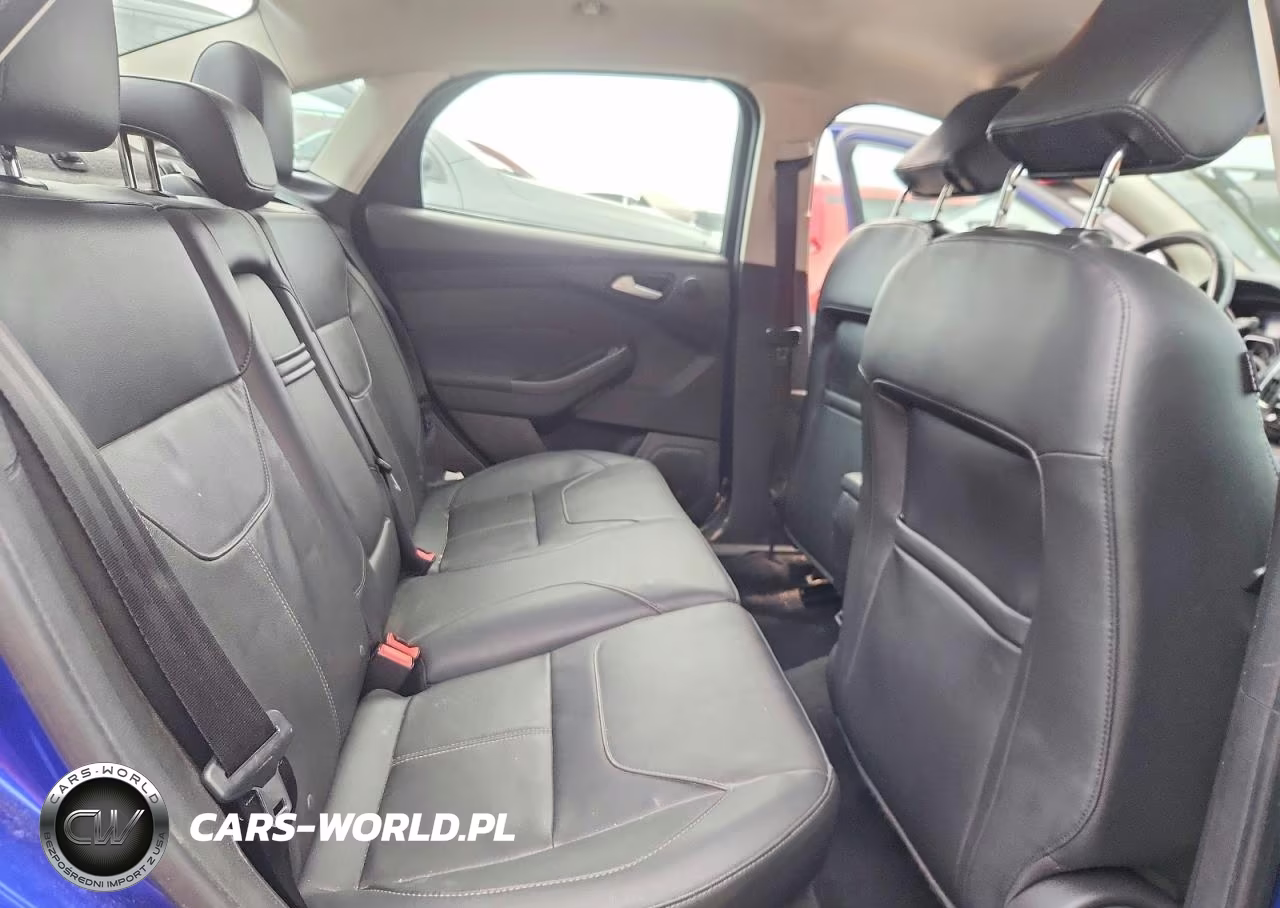 2015 Ford Focus Titanium VIN:1FADP3J24FL339520 - 10