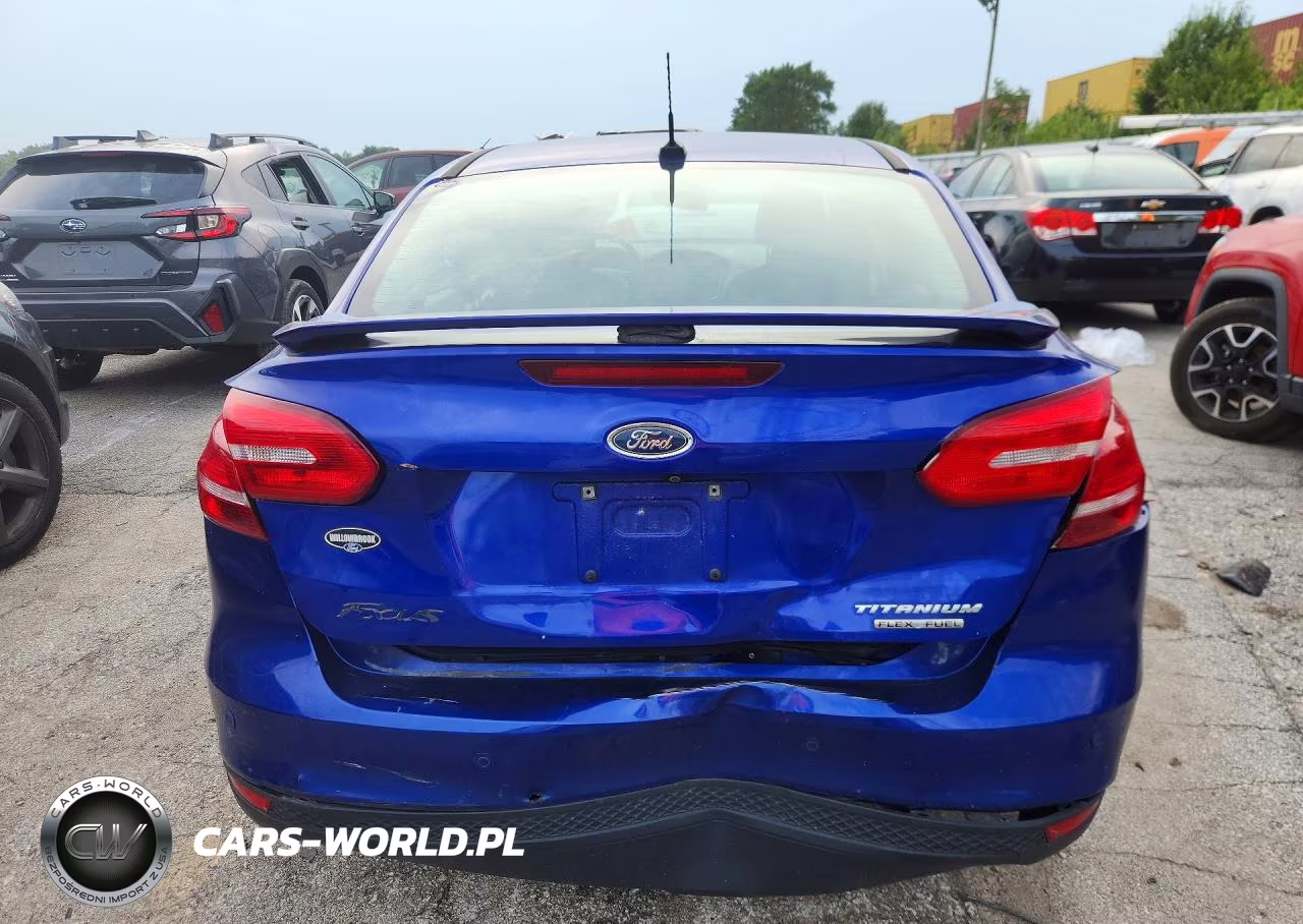 2015 Ford Focus Titanium VIN:1FADP3J24FL339520 - 6