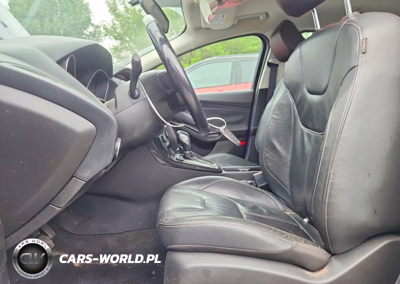 2015 Ford Focus Titanium VIN:1FADP3J24FL339520 - 7