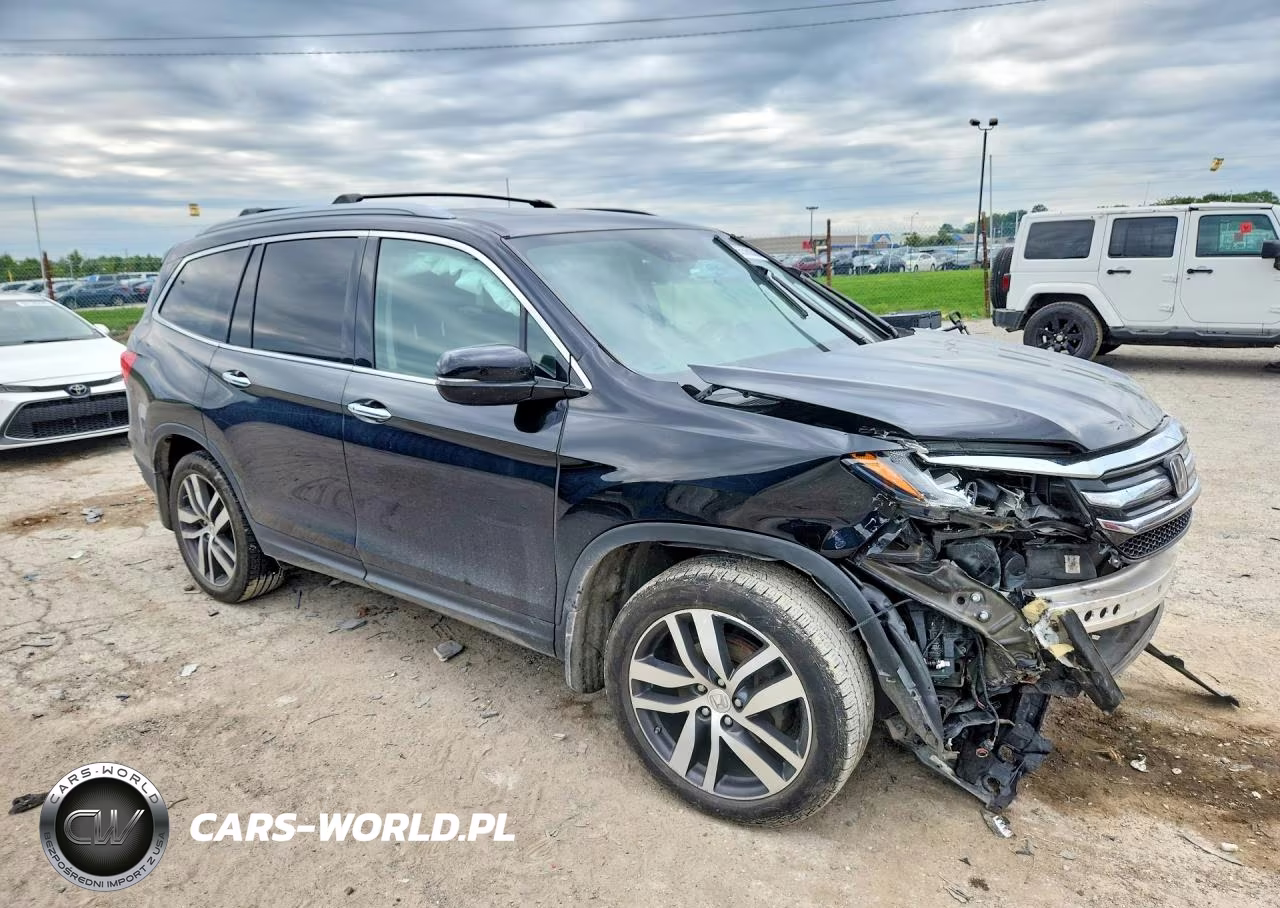 2017 Honda Pilot Elite VIN:5FNYF6H06HB055820 - 4