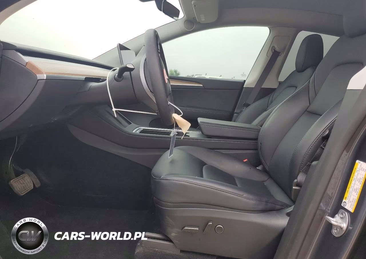 2023 Tesla Model Y VIN:7SAYGDEE6PF916285 - 7
