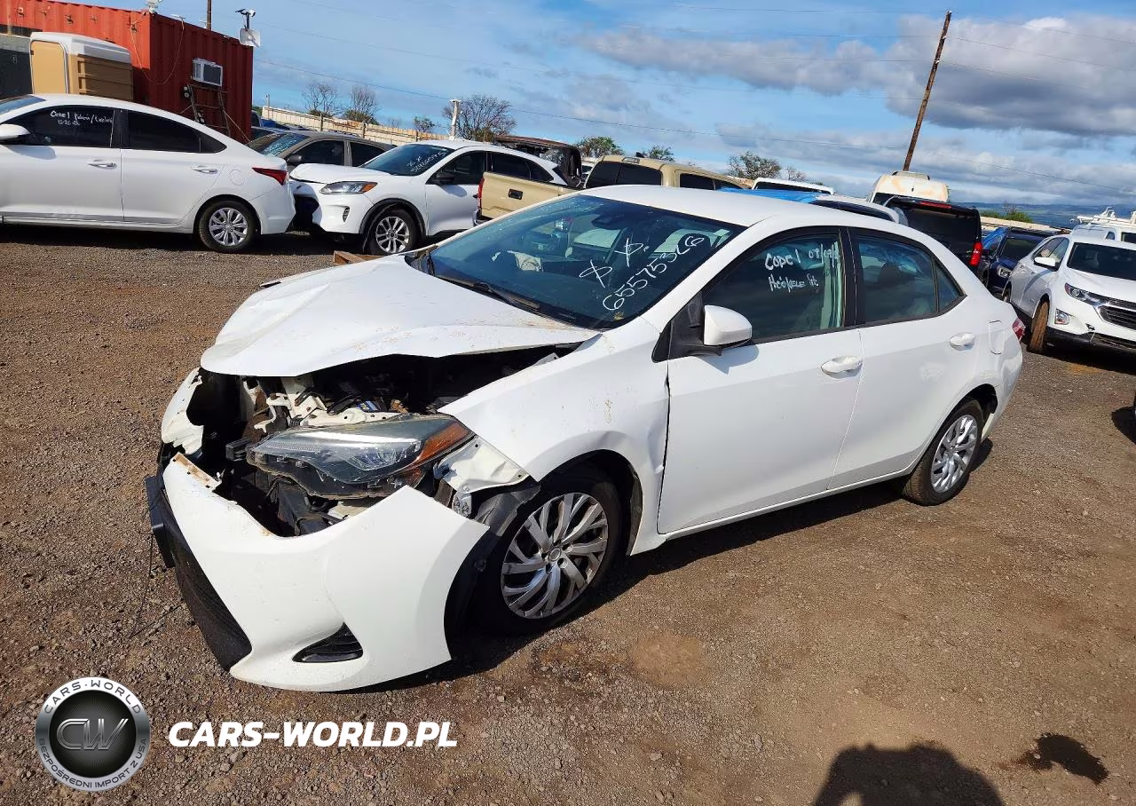 2018 Toyota Corolla L VIN:5YFBURHE6JP773290 - 1