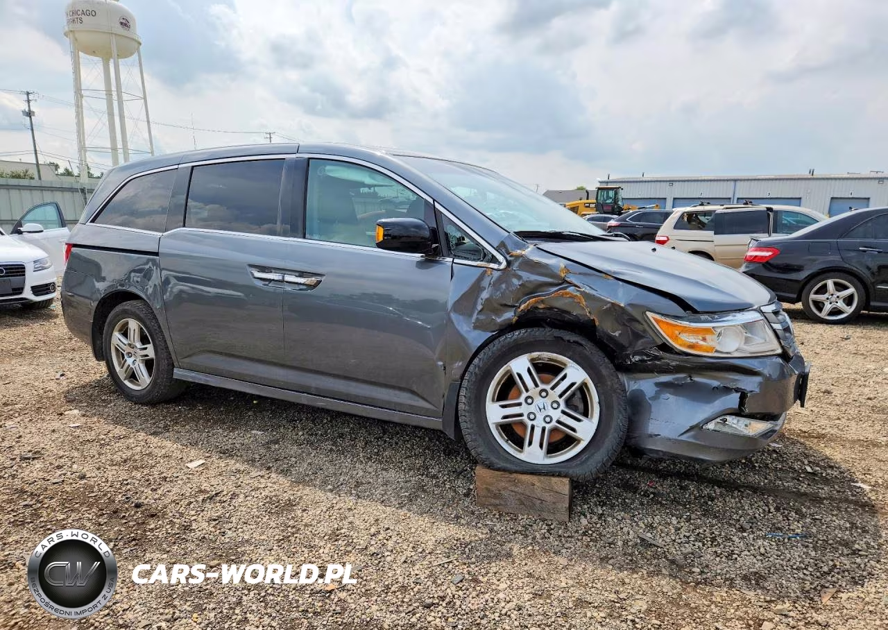 2011 Honda Odyssey Touring VIN:5FNRL5H92BB080467 - 4