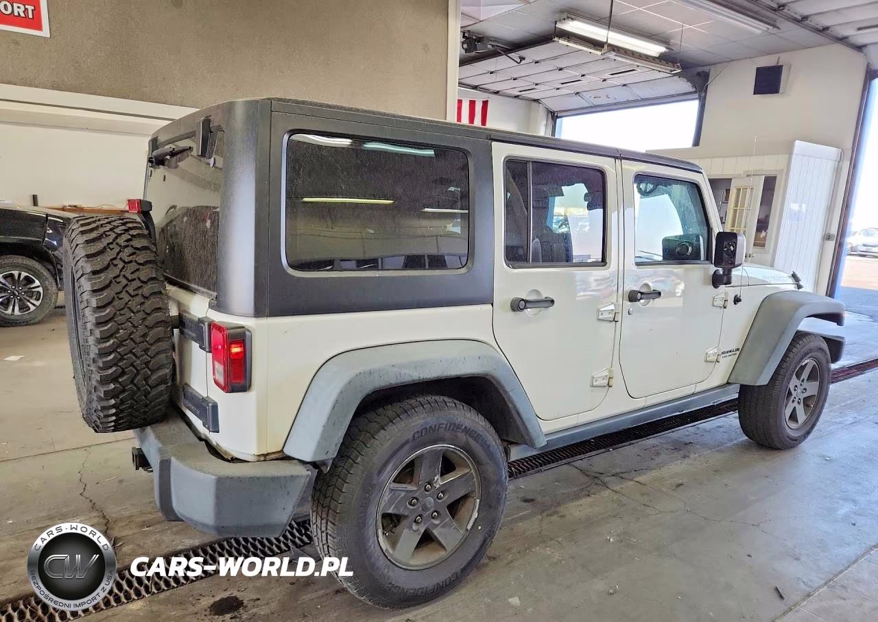 2011 Jeep Wrangler Unlimited Rubicon VIN:1J4HA6H18BL611468 - 3
