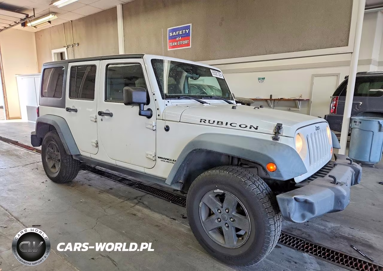 2011 Jeep Wrangler Unlimited Rubicon VIN:1J4HA6H18BL611468 - 4