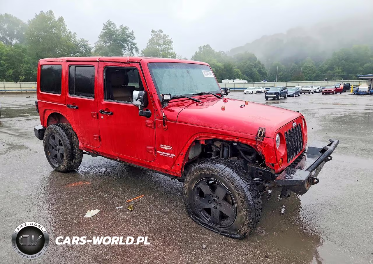 2011 Jeep Wrangler Unlimited Sahara VIN:1J4BA5H15BL638496 - 4