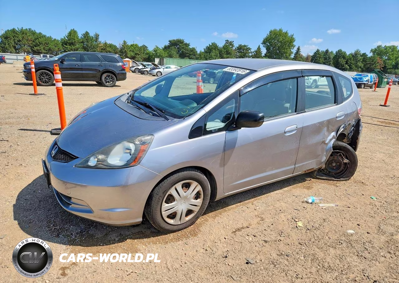 2009 Honda Fit VIN:JHMGE88279S008861 - 1