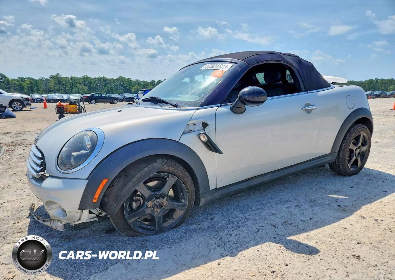 2014 Mini Cooper Roadster VIN:WMWSY1C52ET719641 - 1