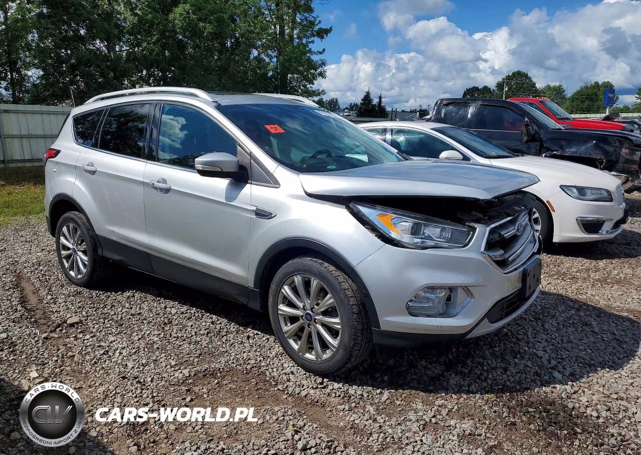 2017 Ford Escape Titanium VIN:1FMCU9J97HUE83148 - 4