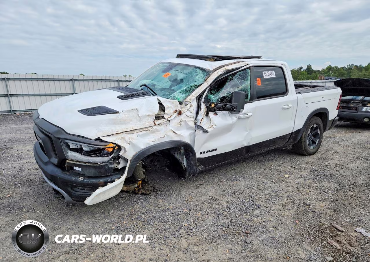 2019 Ram 1500 Rebel VIN:1C6SRFLT7KN731254 - 1