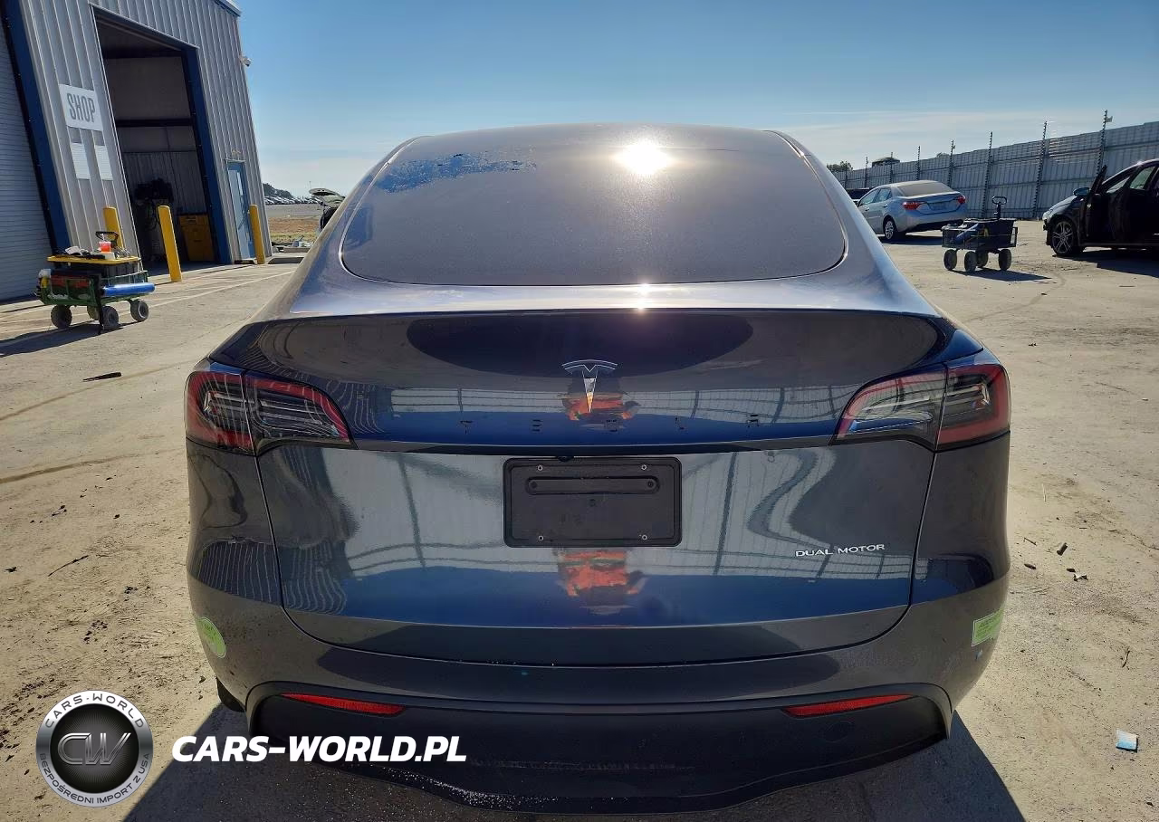 2023 Tesla Model Y VIN:7SAYGDEE8PA163162 - 6