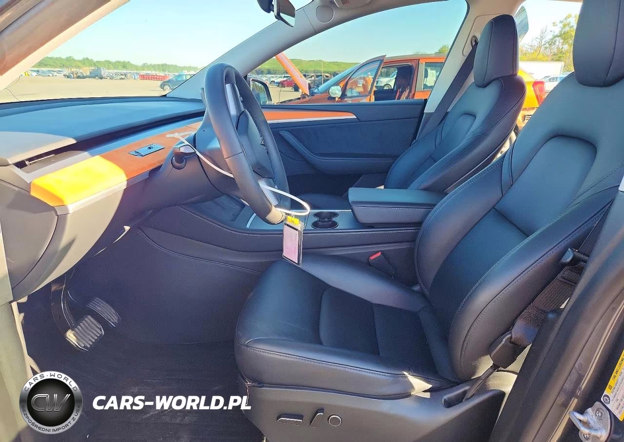 2023 Tesla Model Y VIN:7SAYGDEE2PA179048 - 7