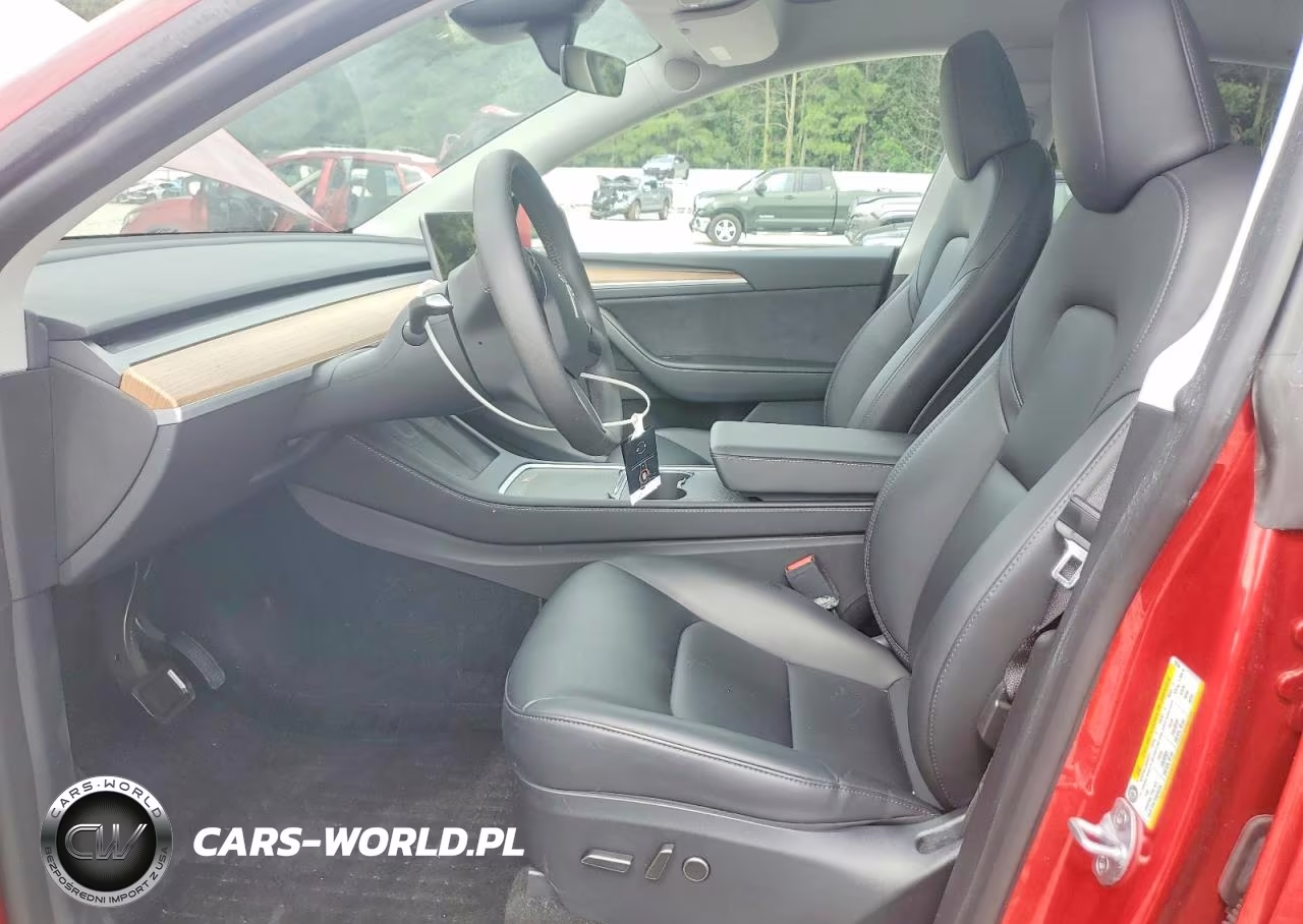 2023 Tesla Model Y VIN:7SAYGDEE4PA198104 - 7