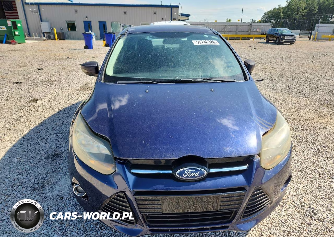 2012 Ford Focus Titanium VIN:1FAHP3N24CL111024 - 5