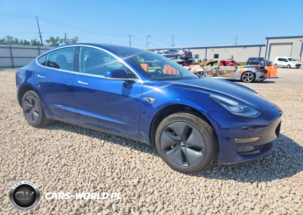 2018 Tesla Model 3 VIN:5YJ3E1EB9JF092128 - 4