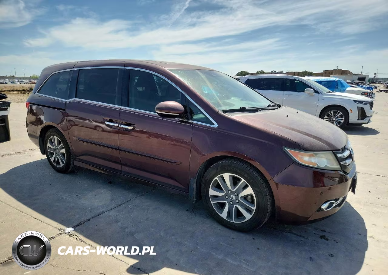 2014 Honda Odyssey Touring VIN:5FNRL5H9XEB111629 - 4