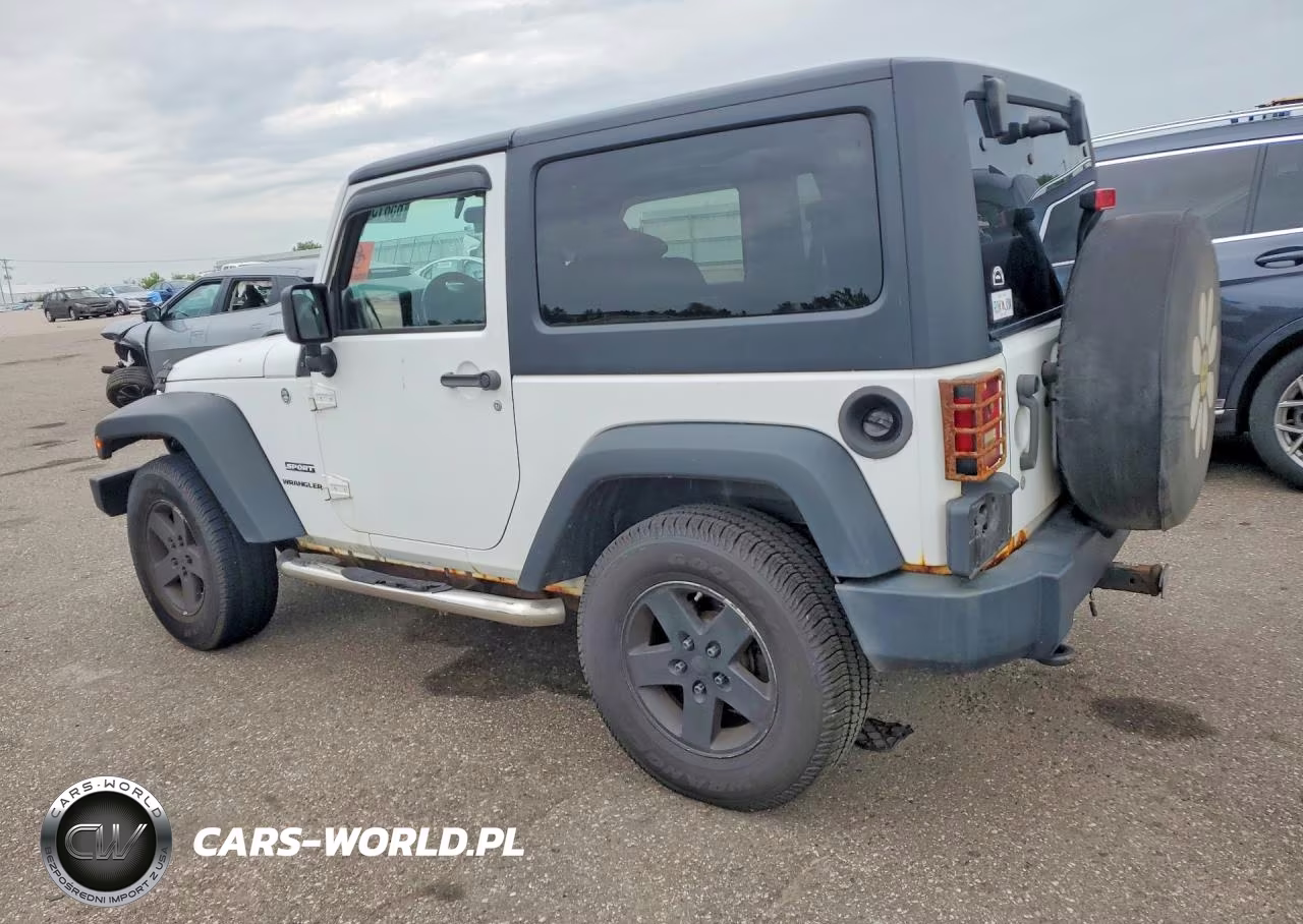 2011 Jeep Wrangler Sport VIN:1J4AA2D10BL636915 - 2
