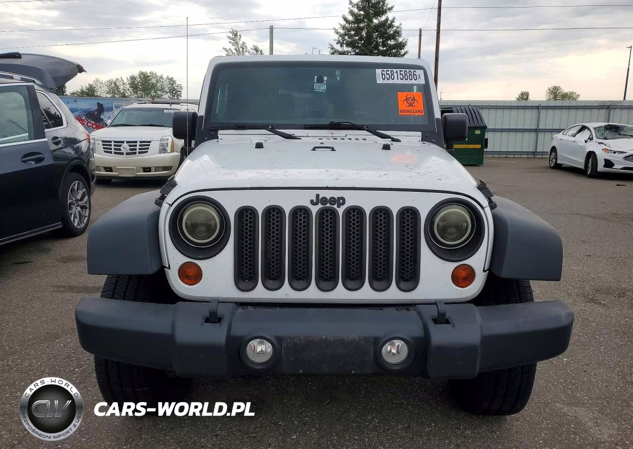 2011 Jeep Wrangler Sport VIN:1J4AA2D10BL636915 - 5