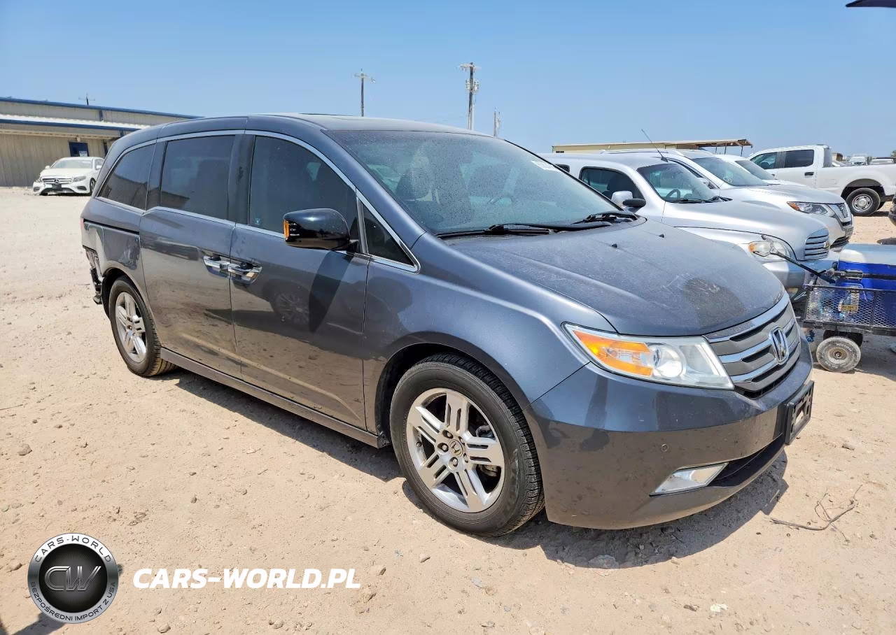 2012 Honda Odyssey Touring VIN:5FNRL5H94CB068824 - 4