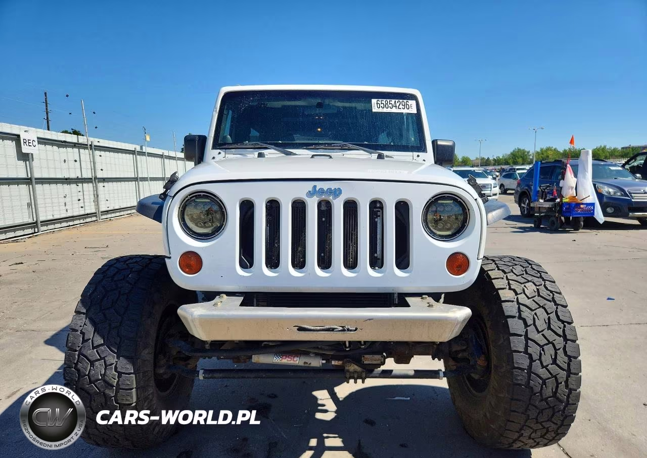 2011 Jeep Wrangler Unlimited Sahara VIN:1J4HA5H11BL574984 - 5
