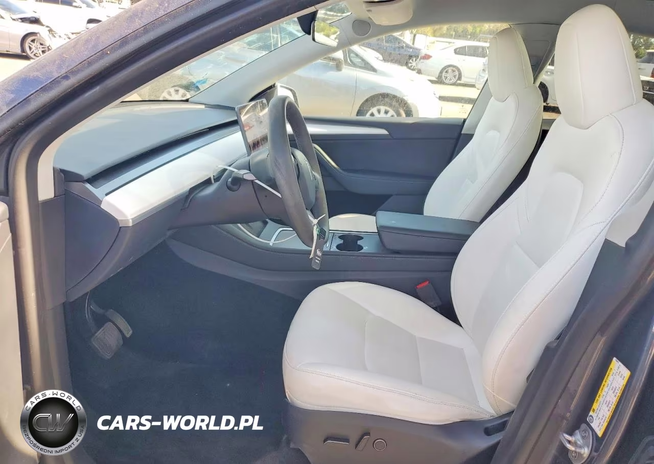 2023 Tesla Model Y VIN:7SAYGDED3PF978413 - 7