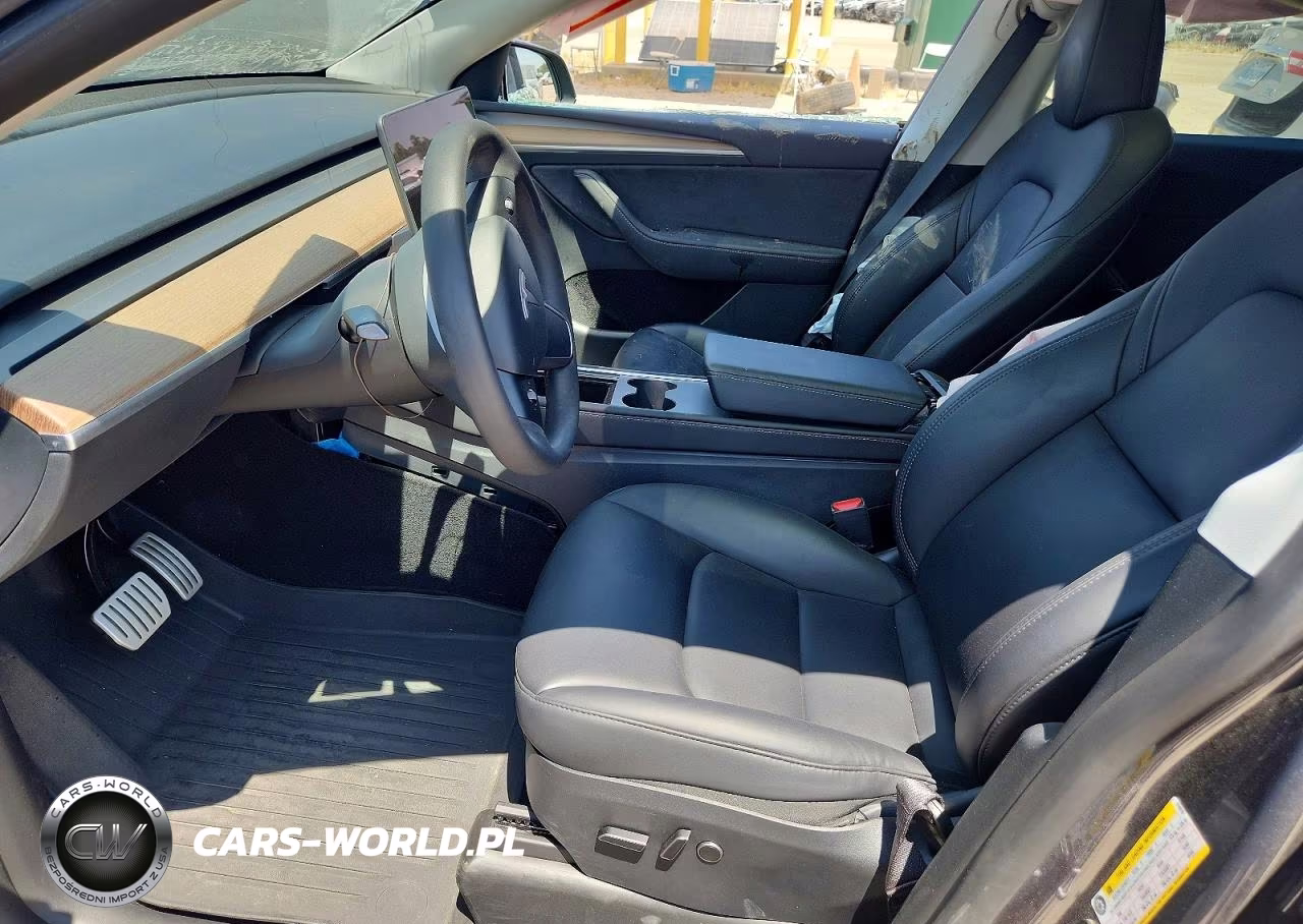 2023 Tesla Model Y VIN:7SAYGDEF7PF874976 - 7