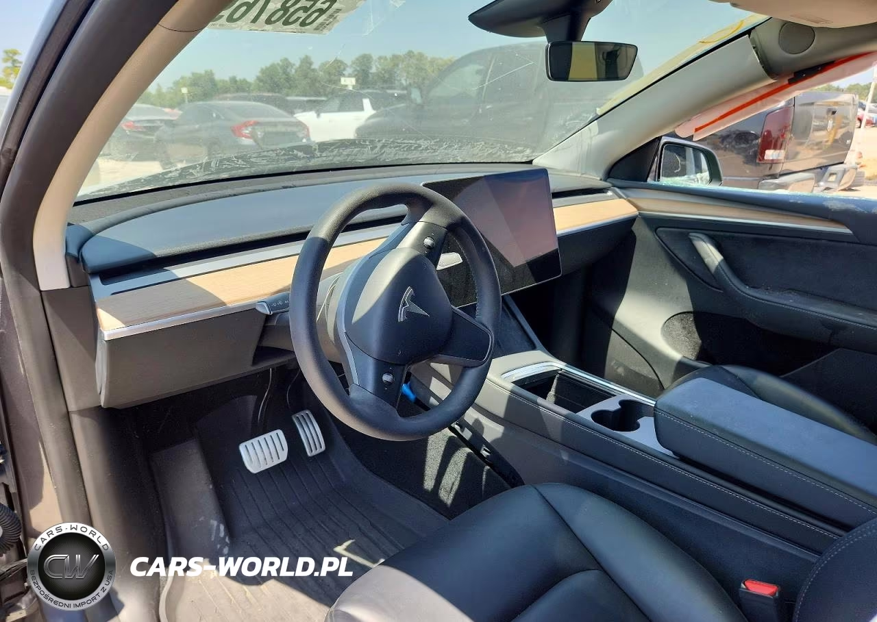 2023 Tesla Model Y VIN:7SAYGDEF7PF874976 - 8