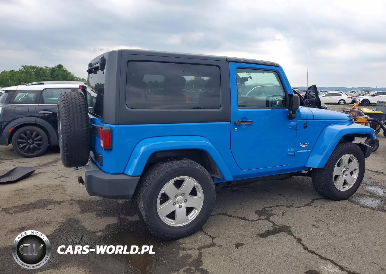 2011 Jeep Wrangler Sahara VIN:1J4GA5D17BL571198 - 3