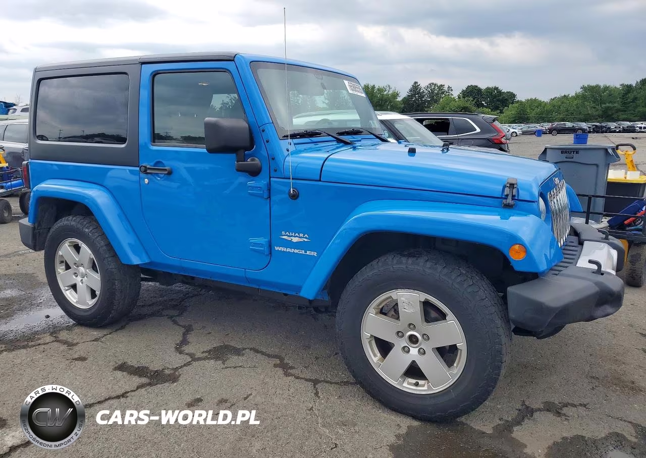 2011 Jeep Wrangler Sahara VIN:1J4GA5D17BL571198 - 4