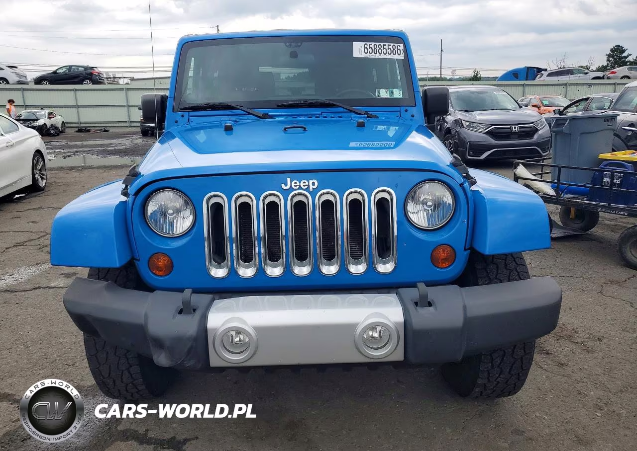 2011 Jeep Wrangler Sahara VIN:1J4GA5D17BL571198 - 5