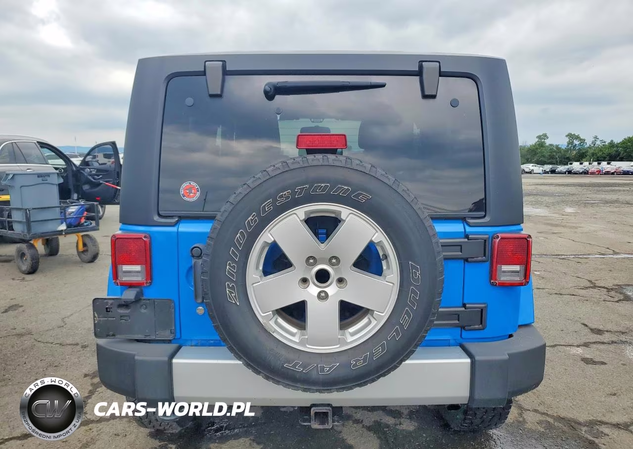 2011 Jeep Wrangler Sahara VIN:1J4GA5D17BL571198 - 6
