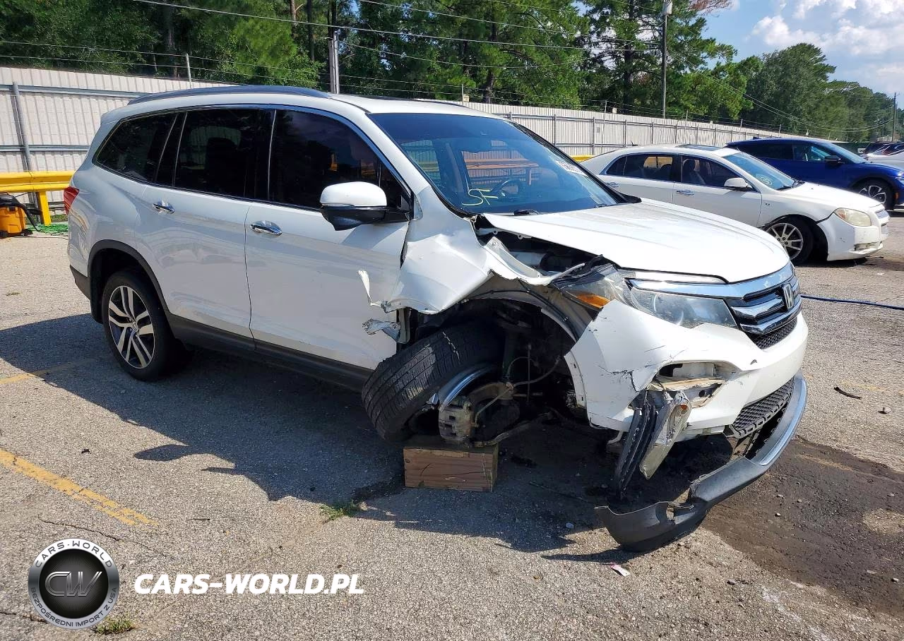 2018 Honda Pilot Touring VIN:5FNYF5H98JB007959 - 4