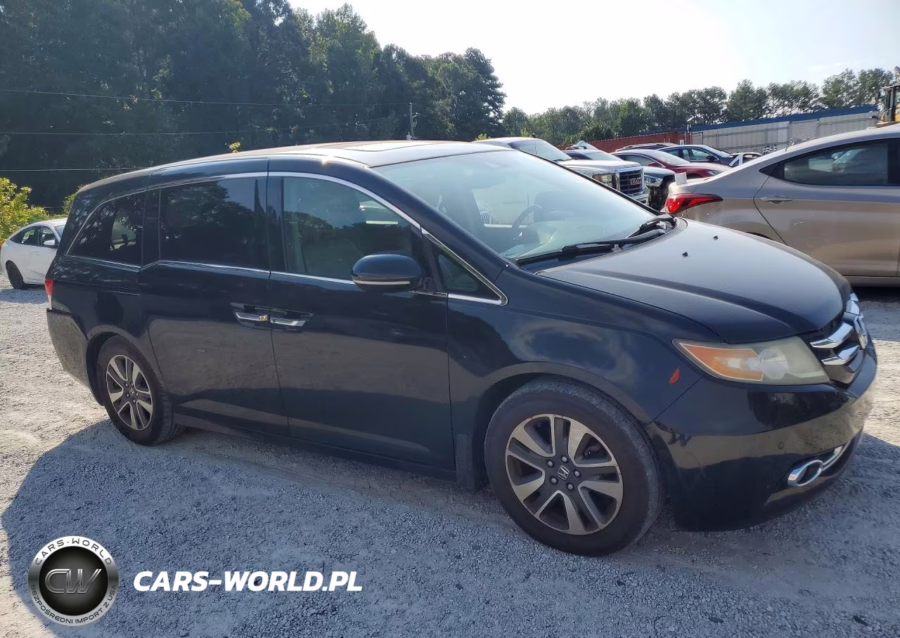 2014 Honda Odyssey Touring VIN:5FNRL5H93EB117546 - 4