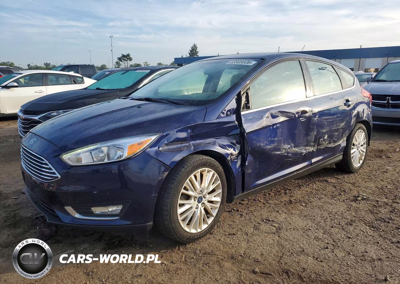 2017 Ford Focus Titanium VIN:1FADP3N23HL333995 - 1