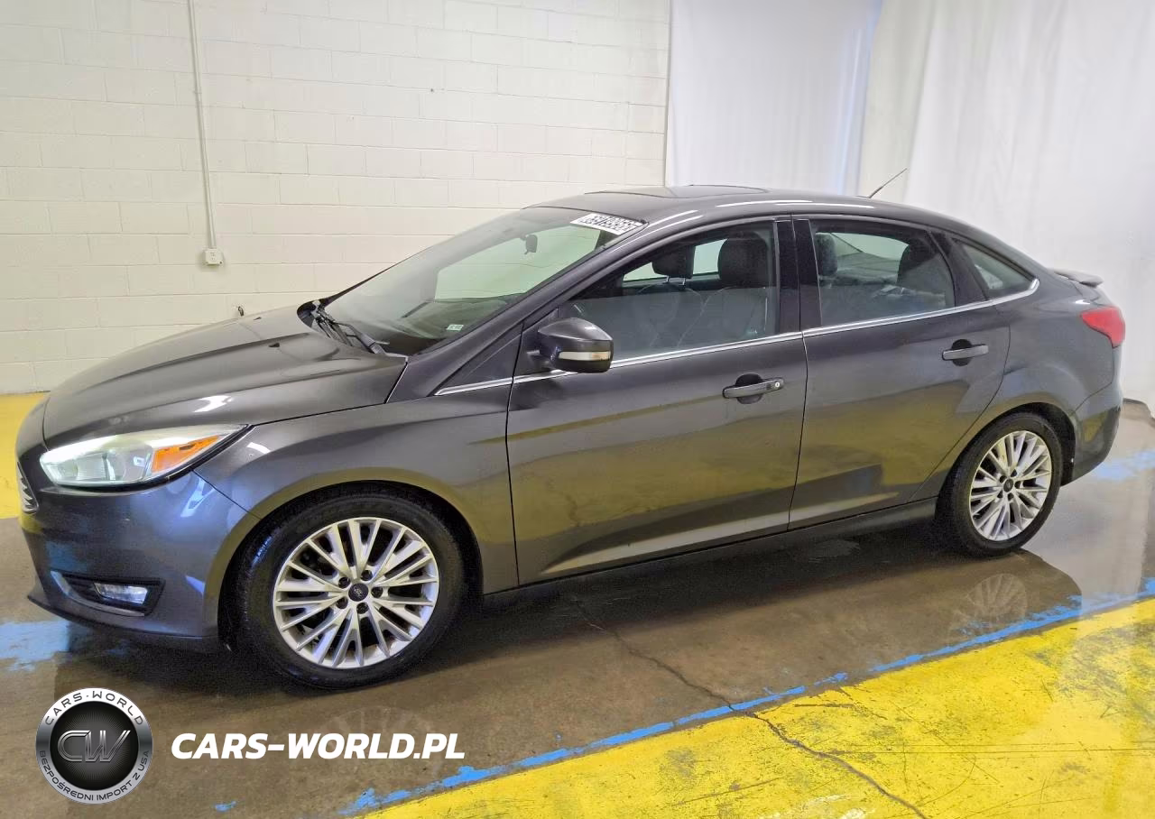 2015 Ford Focus Titanium VIN:1FADP3J27FL200966 - 1