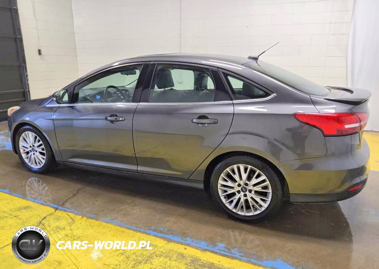 2015 Ford Focus Titanium VIN:1FADP3J27FL200966 - 2