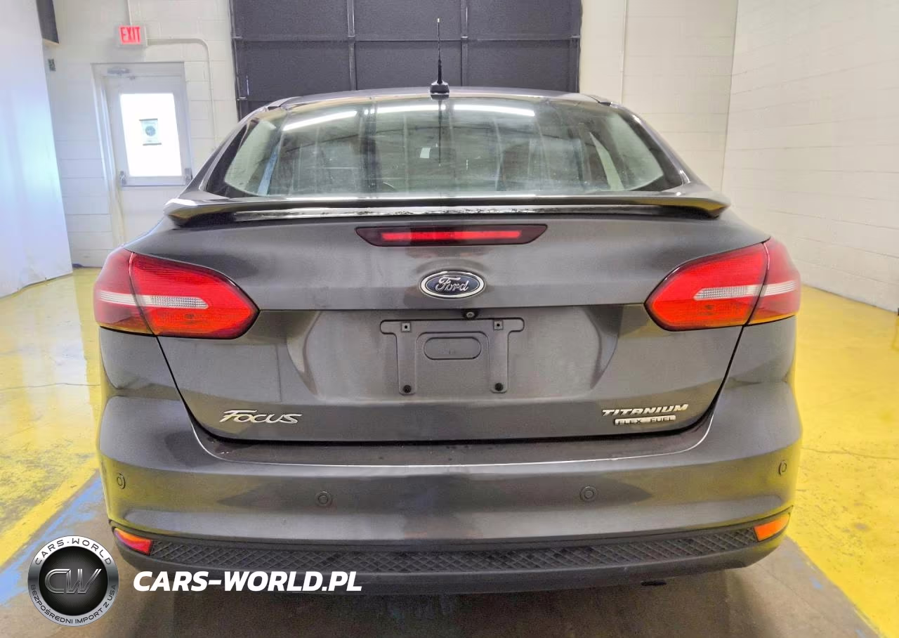 2015 Ford Focus Titanium VIN:1FADP3J27FL200966 - 6