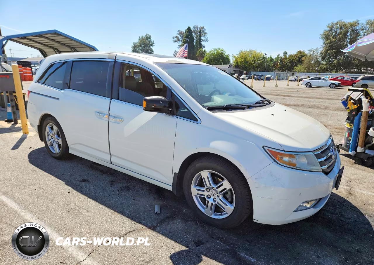 2012 Honda Odyssey Touring VIN:5FNRL5H99CB112722 - 4