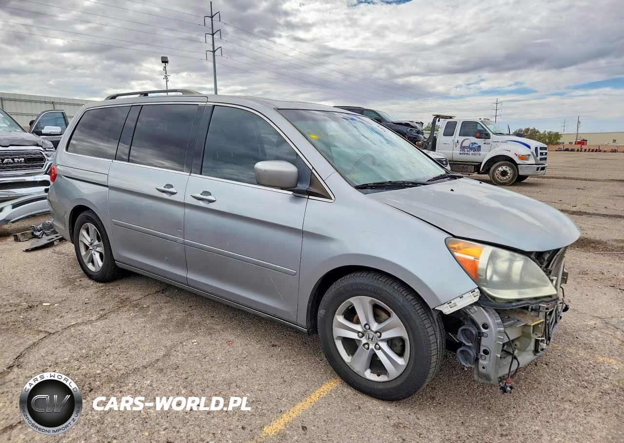 2010 Honda Odyssey Touring VIN:5FNRL3H95AB078702 - 4