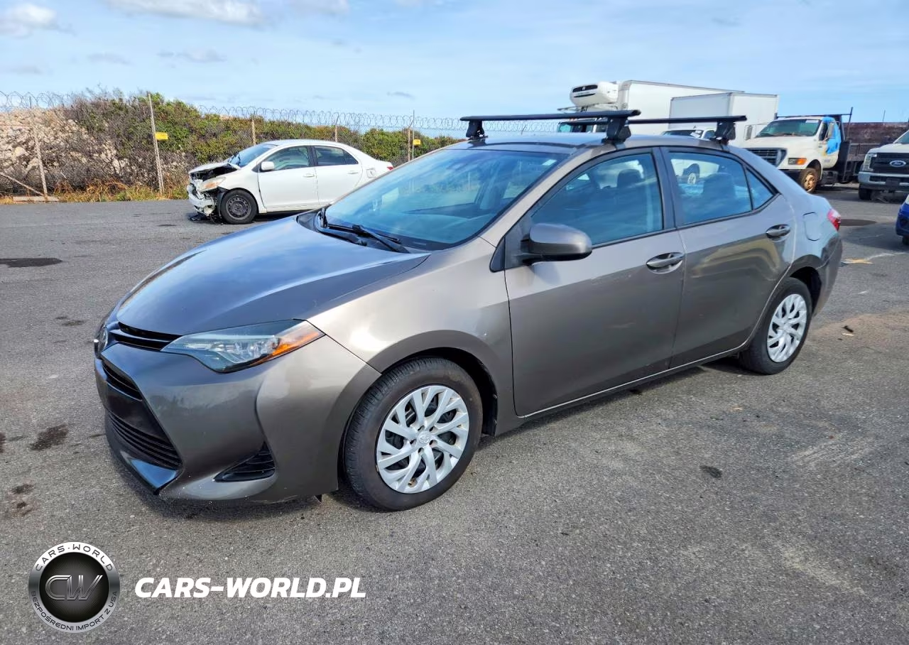 2018 Toyota Corolla L VIN:5YFBURHE4JP765463 - 1