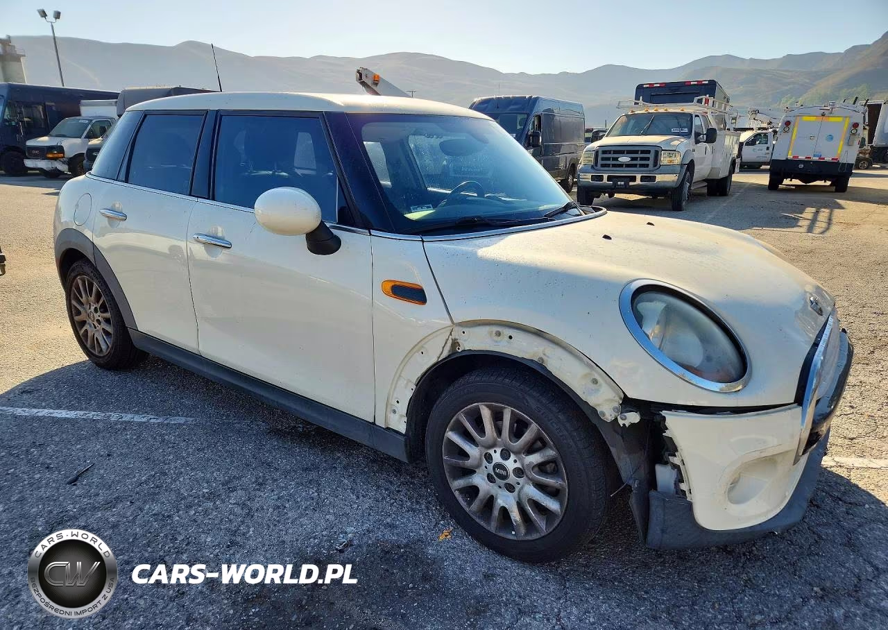 2015 Mini Cooper VIN:WMWXS5C51FT828446 - 4