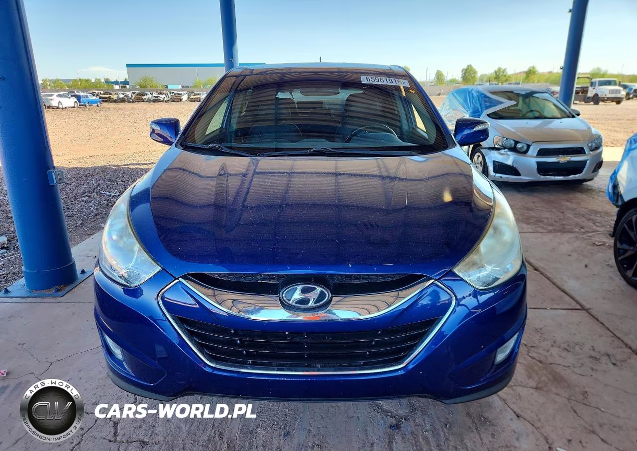 2012 Hyundai Tucson Limited VIN:KM8JUCACXCU404838 - 5