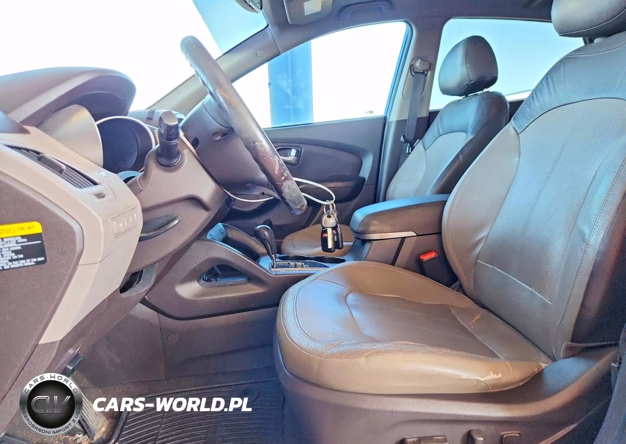 2012 Hyundai Tucson Limited VIN:KM8JUCACXCU404838 - 7