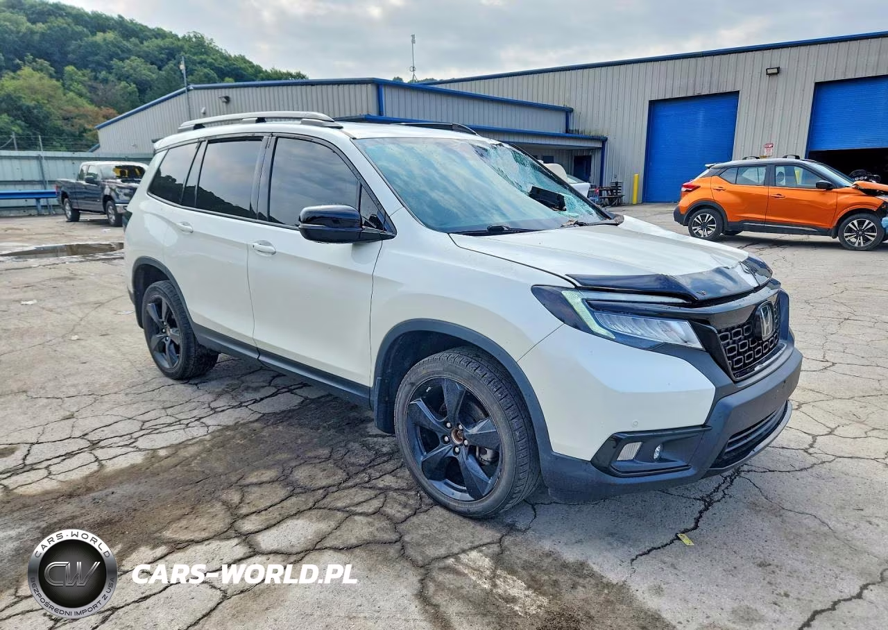 2019 Honda Passport Elite VIN:5FNYF8H08KB001115 - 4