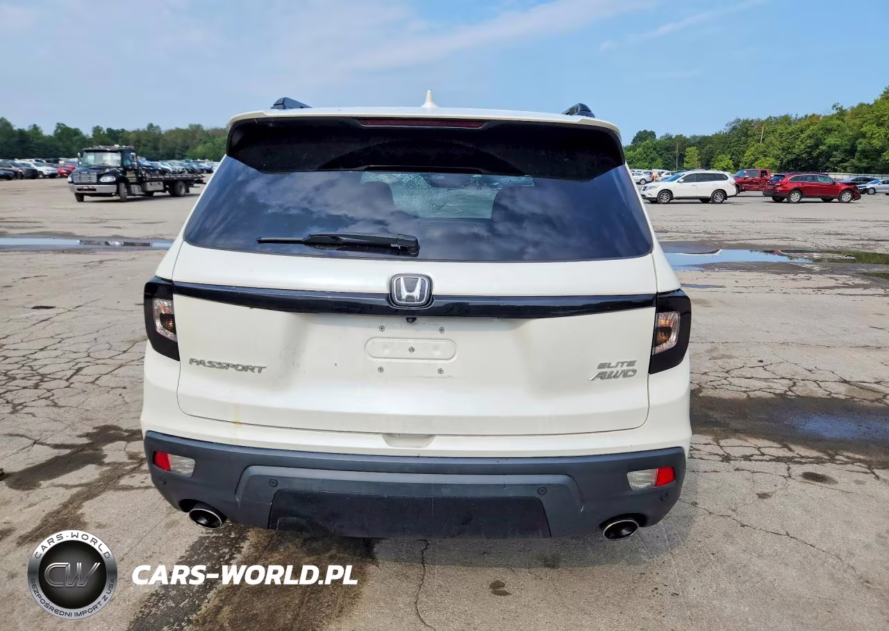 2019 Honda Passport Elite VIN:5FNYF8H08KB001115 - 6