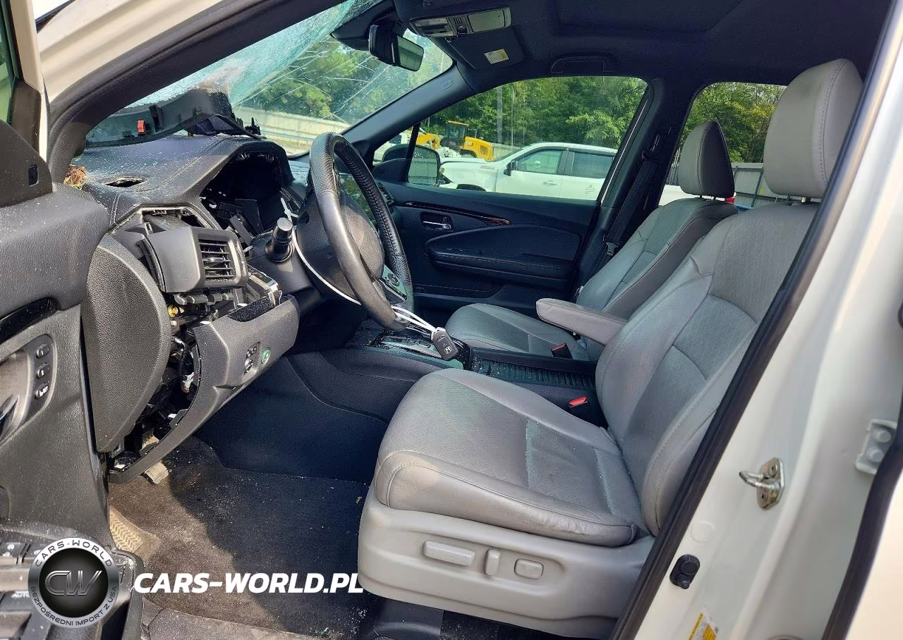 2019 Honda Passport Elite VIN:5FNYF8H08KB001115 - 7