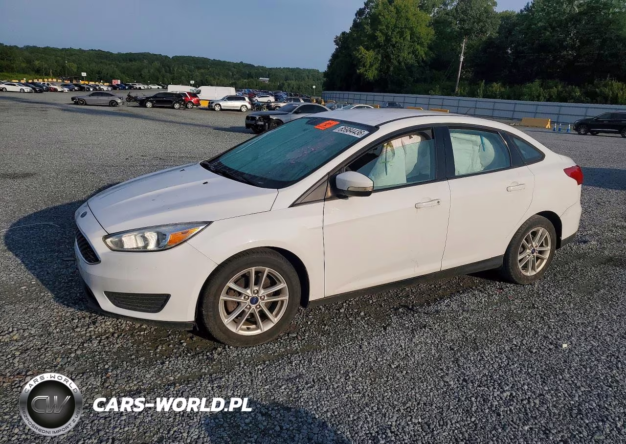 2016 Ford Focus Se VIN:1FADP3F21GL393268 - 1