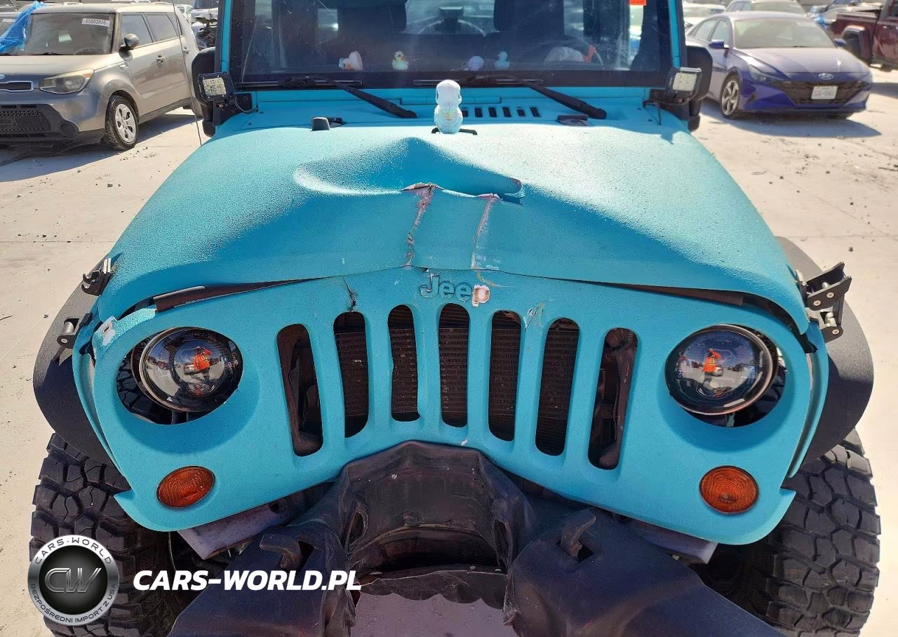 2012 Jeep Wrangler Unlimited Sport VIN:1C4BJWDG0CL205529 - 12